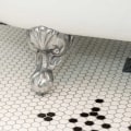 What type of flooring will be used in the bathroom remodeling project?