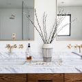 Are there any special requirements for lighting that must be met during the bathroom remodeling project?