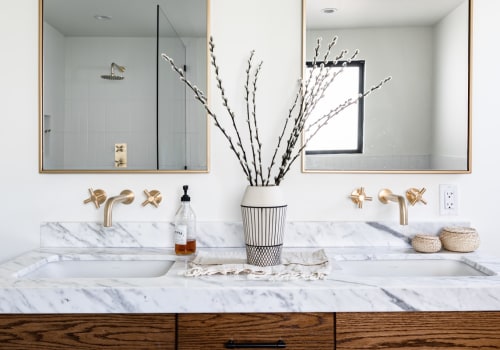 Are there any special requirements for lighting that must be met during the bathroom remodeling project?